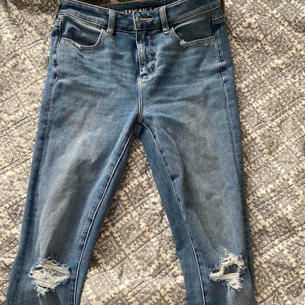 Worn very few times. Distress in knees and a little around ankle.